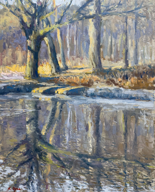 Wschód Słońca nad stawem